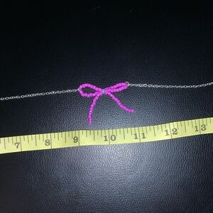 Purple bow necklace